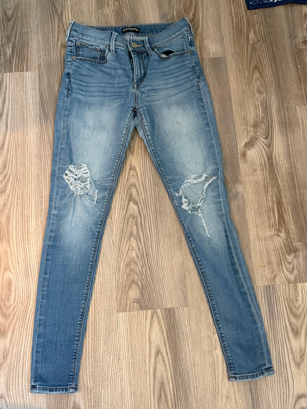 Express Women's Light Blue Distressed Skinny Jeans